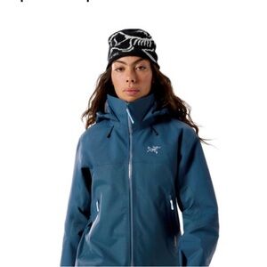 Arc'teryx Black and white Beanie with bird head black is available.